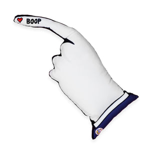 A white and blue dog toy in the shape of a hand, its index finger pointing with a red heart at the tip and "BOOP" written on it. An original from the Lucky Bubs pet store.